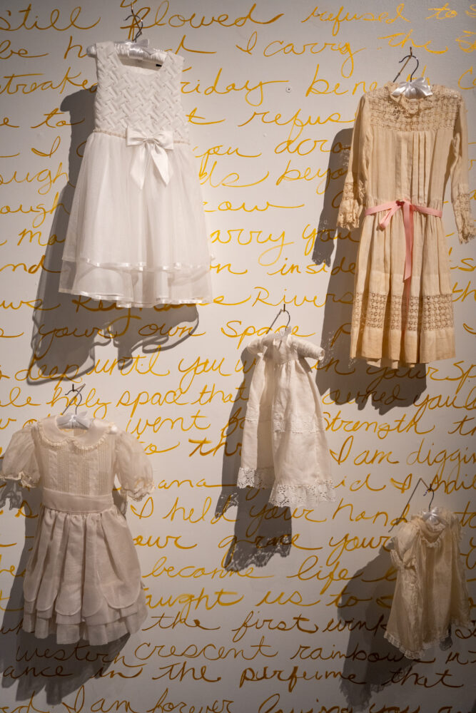 Group of children's white dresses